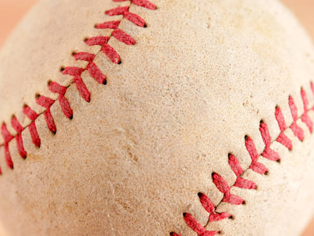 istock Sports Equipment old Baseball background texture 1036138512