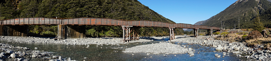 Panoramic of the Bealey River as it runs past the small township of Arthurs Pass on New Zealand's South Island.
