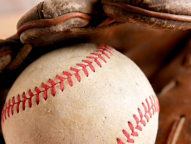 istock Sports Equipment old Baseball background texture 1036139938