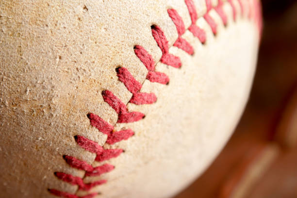istock Sports Equipment old Baseball background texture 1036140014