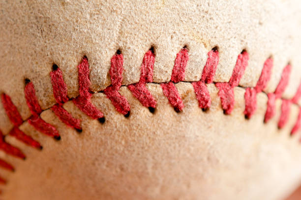 istock Sports Equipment old Baseball background texture 1036140098