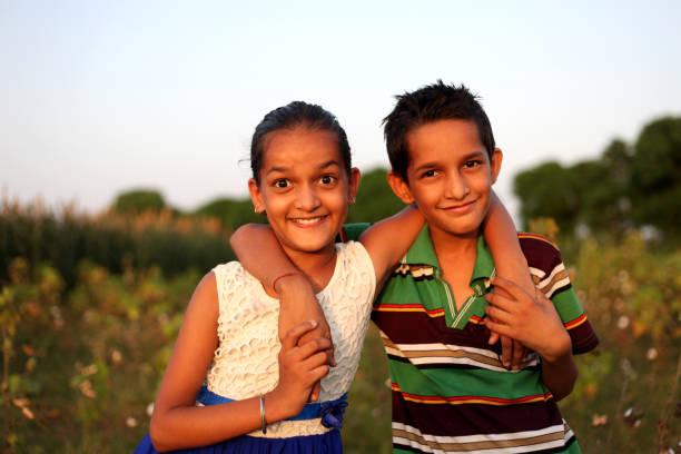 istock Siblings portrait outdoor 1036141254