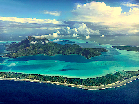 Stunning view of Bora Bora Island just before landing there. French Polynesia, South Pacific Ocean.