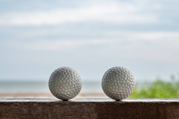 istock Golf ball with sea view 1036174138