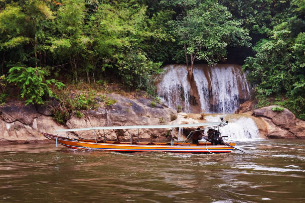 istock Waterfall summer season in Thailand 1036174752