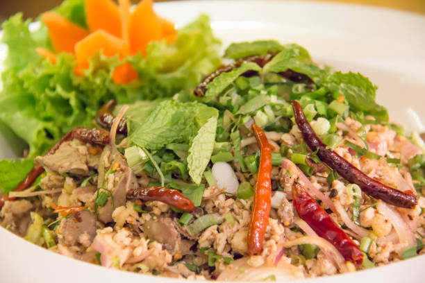 istock spicy salad with minced and pork 1036177742