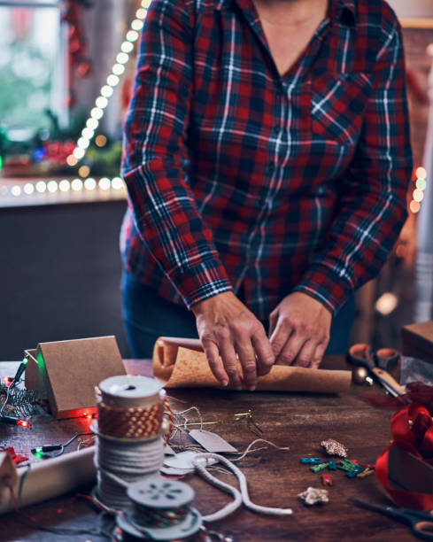 istock Wrapping and Decorating Christmas Presents 1036181482