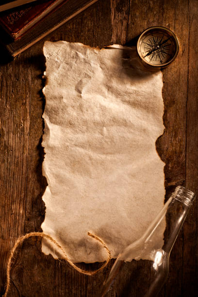 istock Antique blank piece of paper with a message from bottle 1036181638
