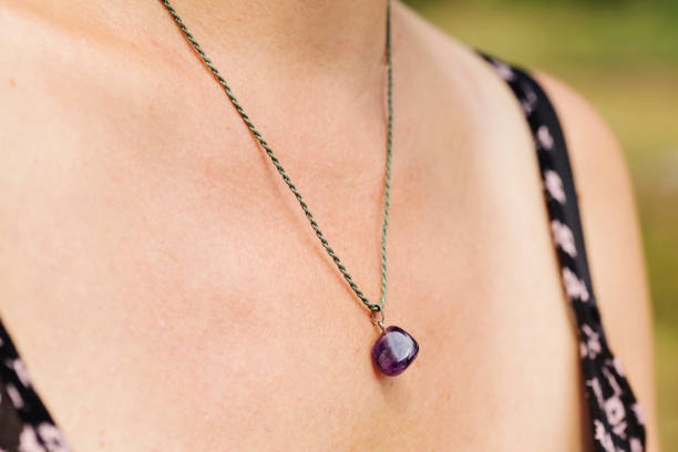 istock Woman wearing a Amethyst pendant 1036182302