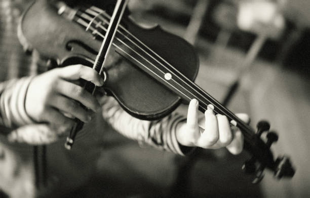 istock A little Anne-Sophie is practicing on her violin 1036185446