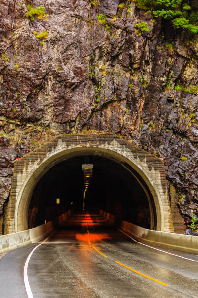 istock tunnel on the norwegian mountain road 1036186146