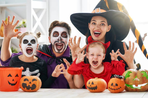 istock family celebrating Halloween 1036194398
