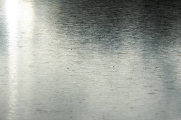istock Grungy scratched stainless steel surface for graphic design and backdrop or textures for game developers. 1036198146