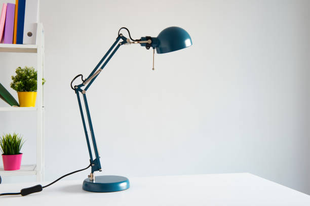 istock Table lamp at the desk 1036198782