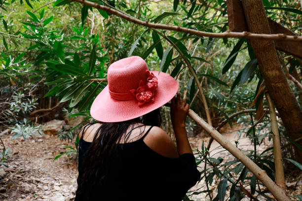 istock Young woman with hat at forest 1036201578
