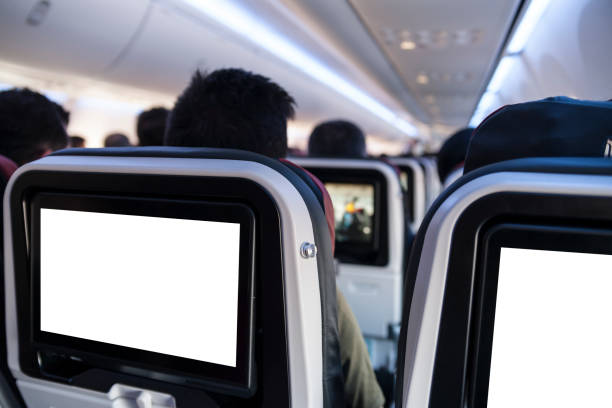 istock Commercial aircraft cabin with passengers 1036209716