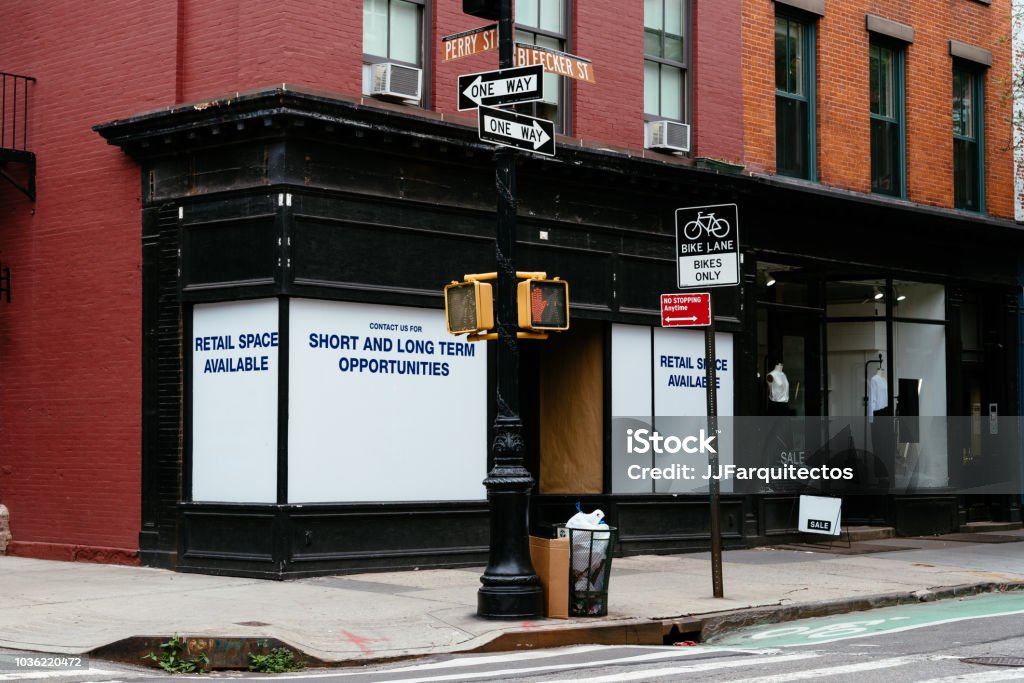 Retail space available for lease in New York Retail space available for sale or lease in colorful old building in Greenwich Village in New York Store Stock Photo