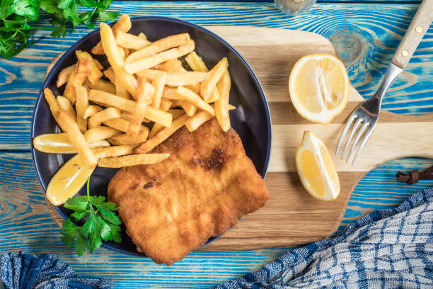 istock A piece of fried cod with fries on a plate. 1036221220
