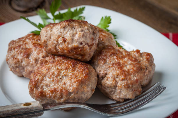 istock Meatball with parsley. 1036221524