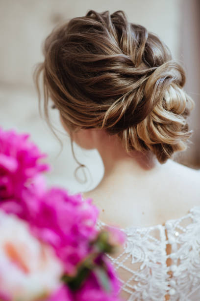 istock Beautiful model girl with flowers peony 1036223726
