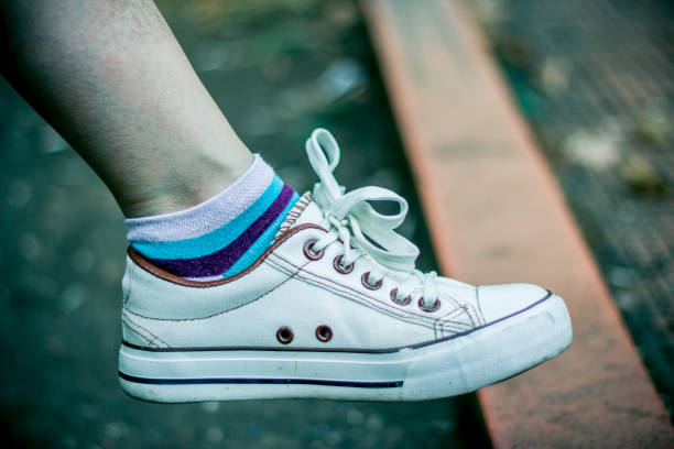 istock Girl with white sneaker 1036223734