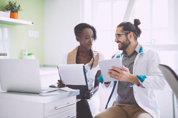 istock Doctors are checking medical records together 1036234214