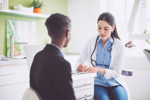 istock Doctor is writing a prescription in her office 1036234642