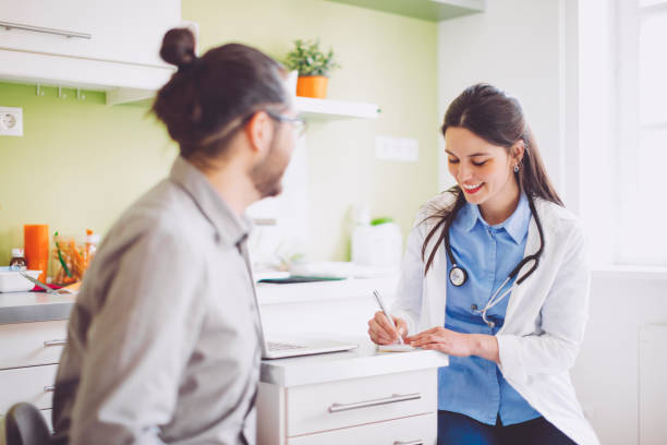istock Doctor is writing a prescription in her office 1036234852