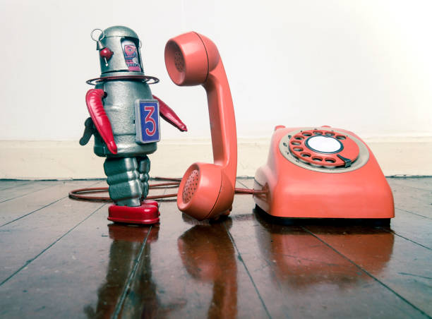 istock vintage robot on the phone standing 1036235332