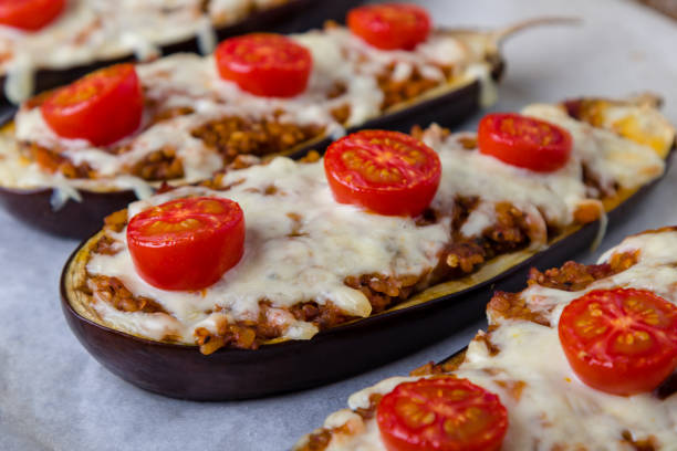 istock healthy bulgur stuffed eggplant with cherry tomatoes and cheese 1036240802