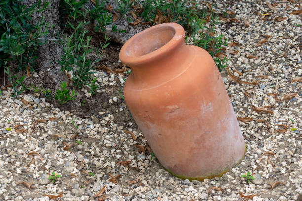 istock Antique Amphora in the garden 1036243574