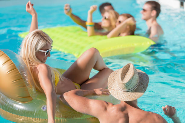 istock Young People On A Pool Party 1036243804