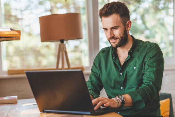 istock Young man having stressful time working on laptop 1036244168