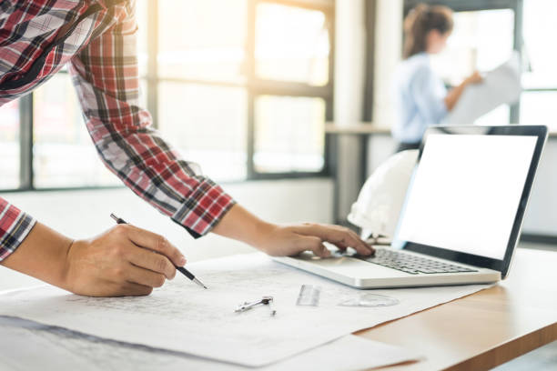 istock Businesswoman Using Laptop On Table 1036248892