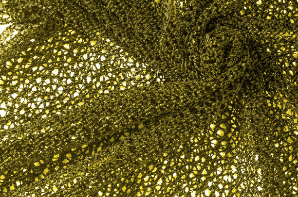 texture, background, pattern. lace fabric. mustard yellow gold color. absolutely stunning - most of the demonstration of extreme luxury at couture shows. get a red carpet with this lace lace - 11315 imagens e fotografias de stock