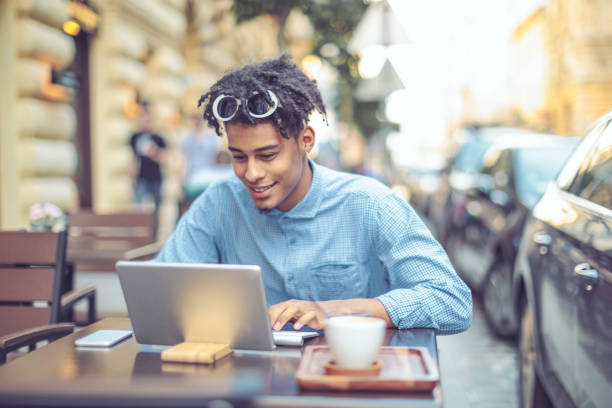 istock Young influencer is blogging from a sidewalk caffee 1036254034