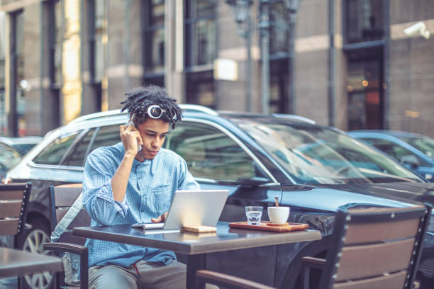 istock Young influencer is blogging from a sidewalk caffee 1036256180
