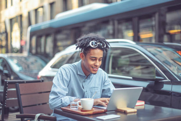 istock Young influencer is blogging from a sidewalk caffee 1036256992