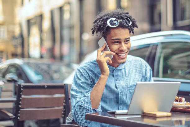istock Young influencer is blogging from a sidewalk caffee 1036257442