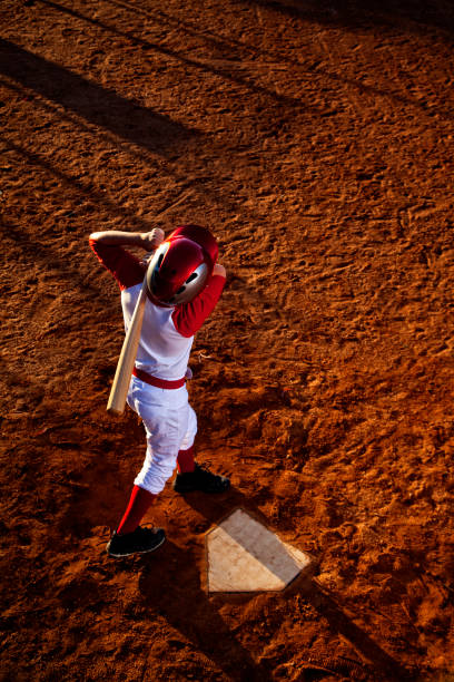 istock Baseball Player Hitting the Ball - Stock image 1036257530