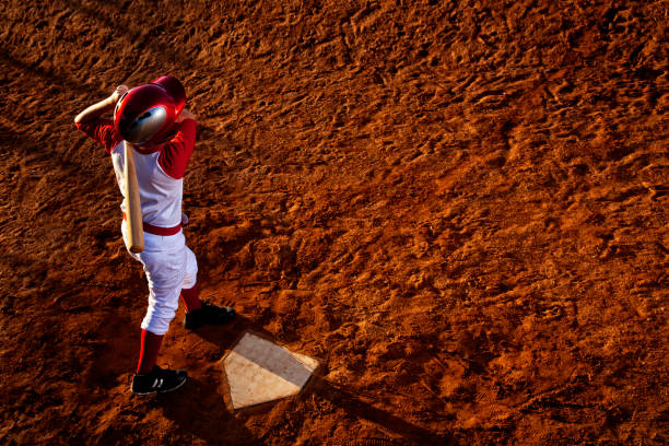 istock Baseball Player Hitting the Ball - Stock image 1036257534