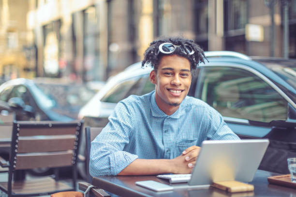 istock Confident young influencer is blogging from a sidewalk caffee 1036258558