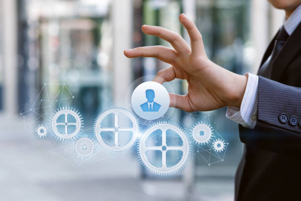 istock Touching the icon of an employee control mechanism. 1036259990