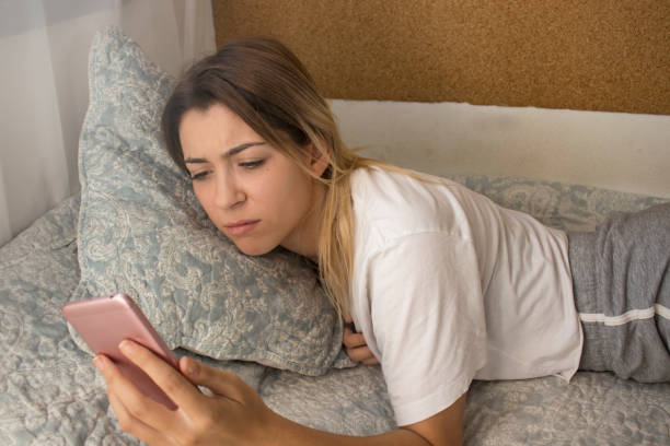 istock Nervous woman checking phone 1036261376