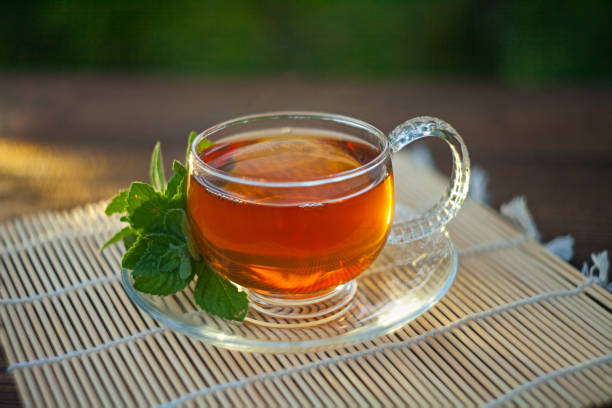 istock delicious green tea in a beautiful glass bowl on table 1036264962