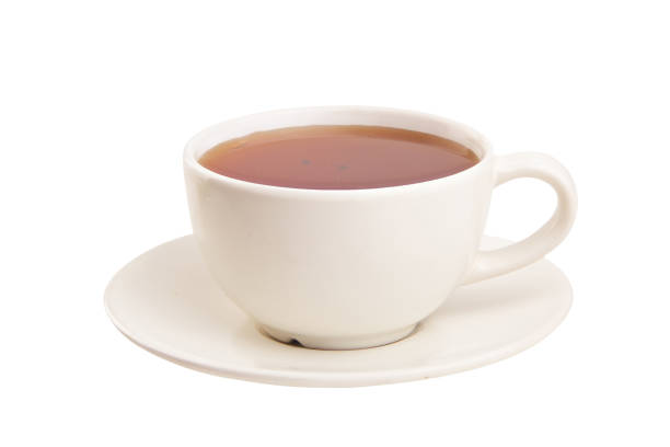 istock porcelainl cup with green tea on table 1036265100