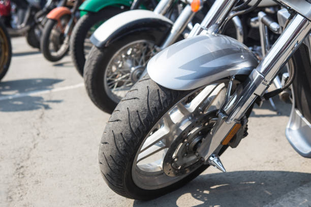 istock motorcycles on parking on asphalt 1036269220