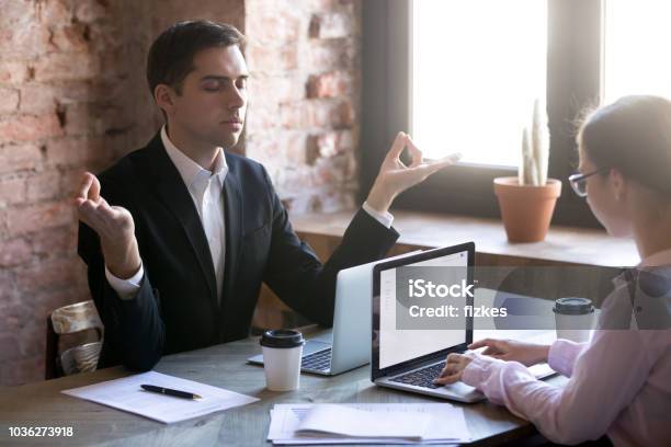 Meditating At Workplace Stock Photo - Download Image Now - Adult, Adults Only, Balance