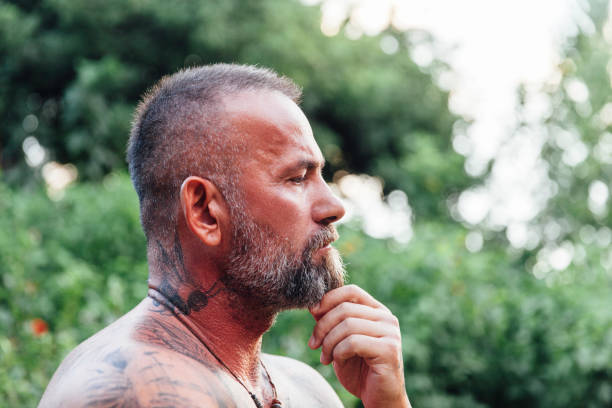 istock Portrait of mature man thinking 1036284594