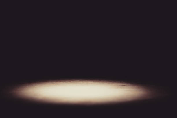 Theater lights spotlights and smoke over the stage, texture background for design.